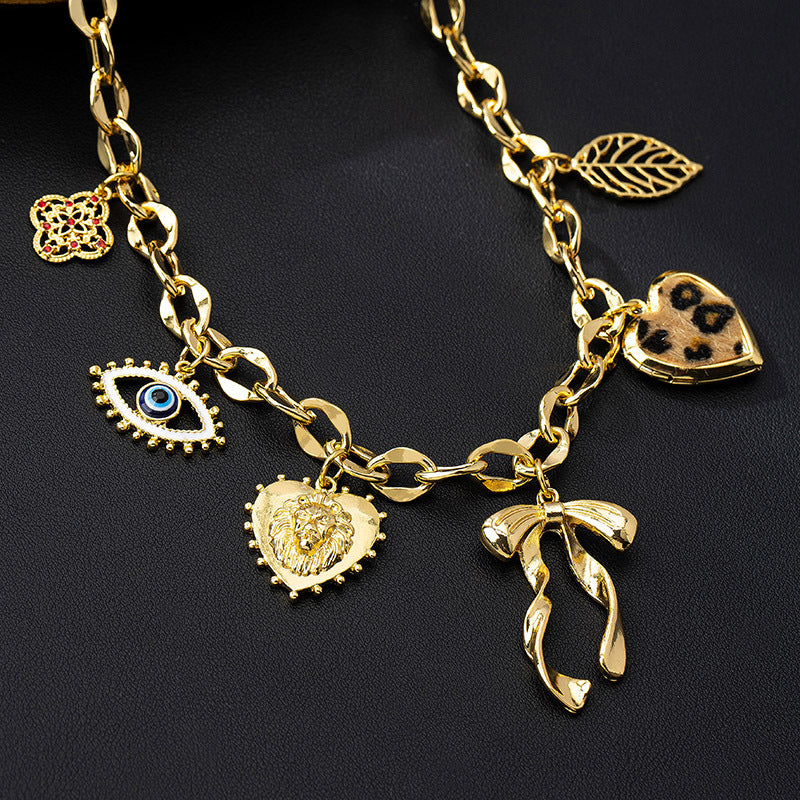 Bowknot Heart Pendant Necklace with Eye and Leaf Design – Lytton