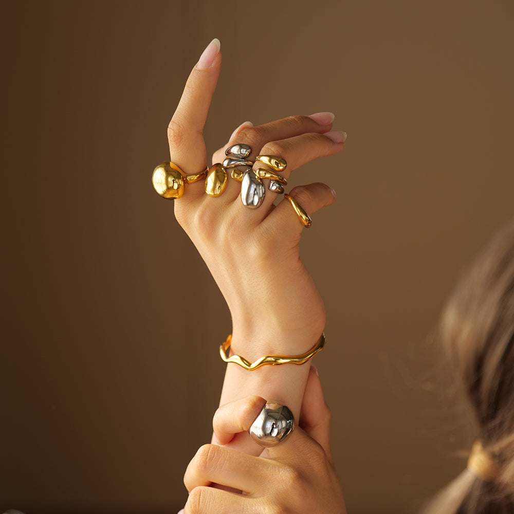 Elegant Gold Spherical Ring – Alfraye