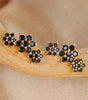 Elegant Flower Stud Earrings with Shiny Obsidian and  Cubic Zirconia - Hopkins